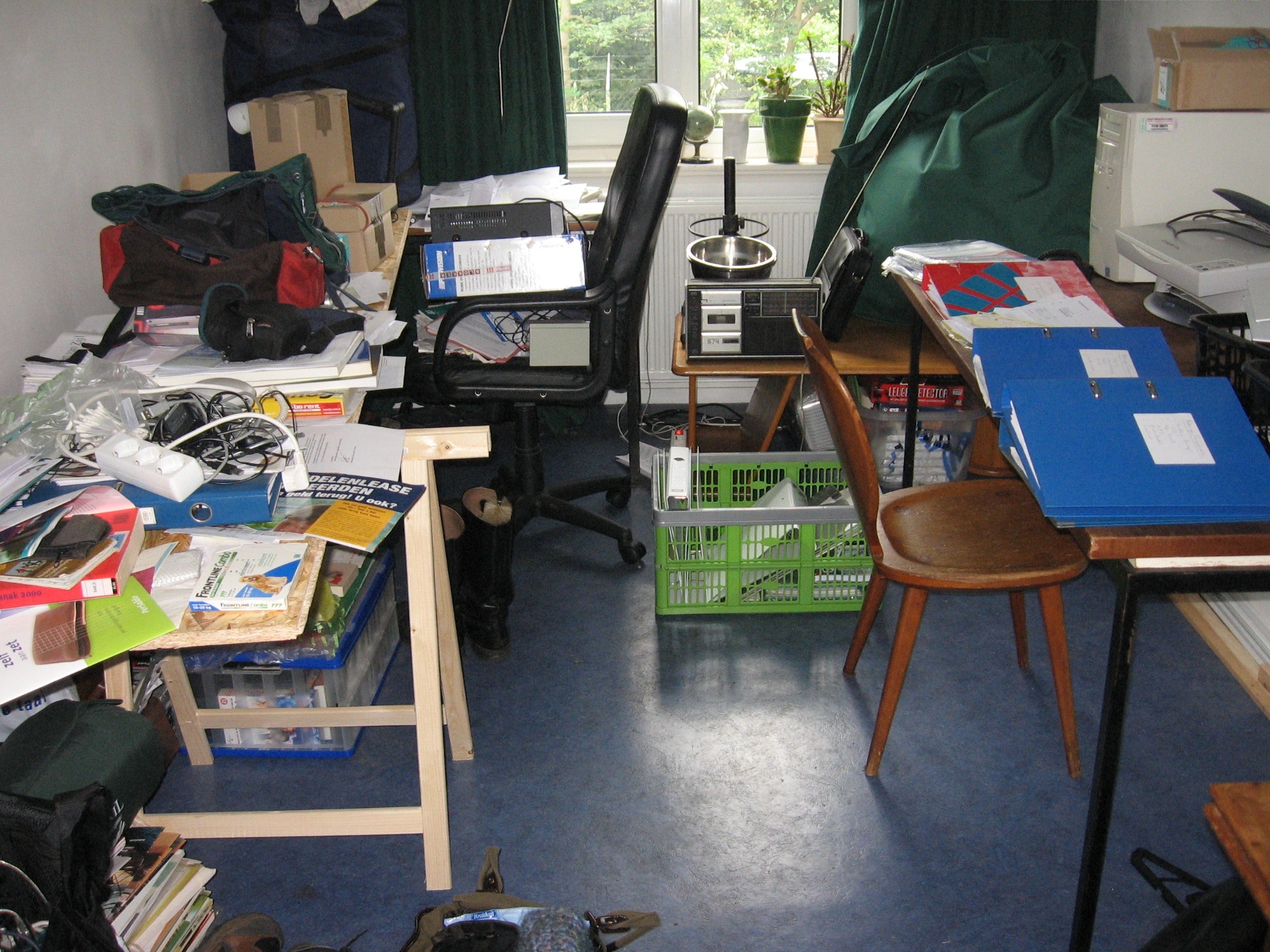 A cluttered room, in need of cleaning and decluttering