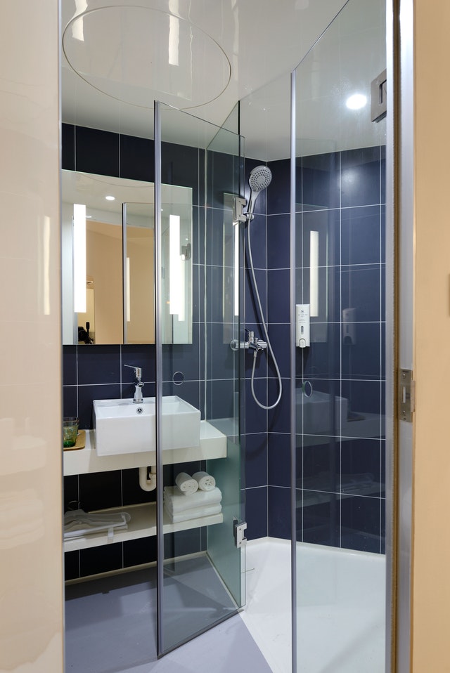 a very clean shower with streak free glass doors