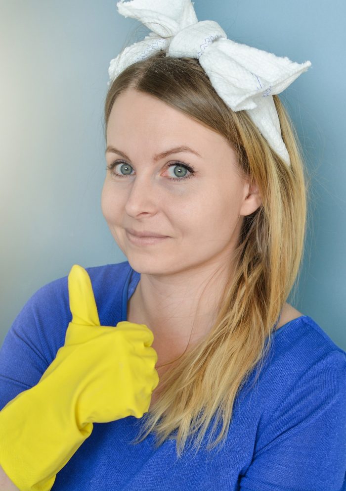 a happy cleaner giving a thumbs up