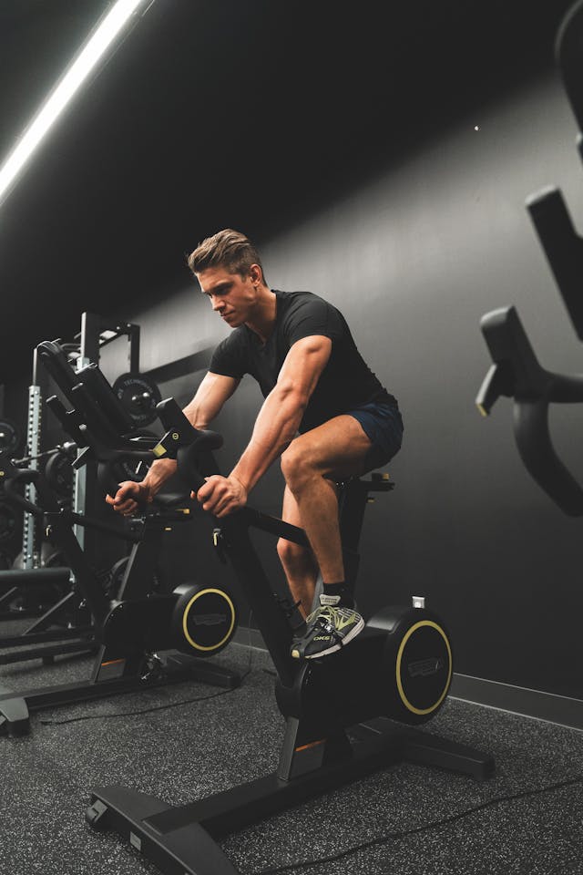 a man on an indoor stationary bike